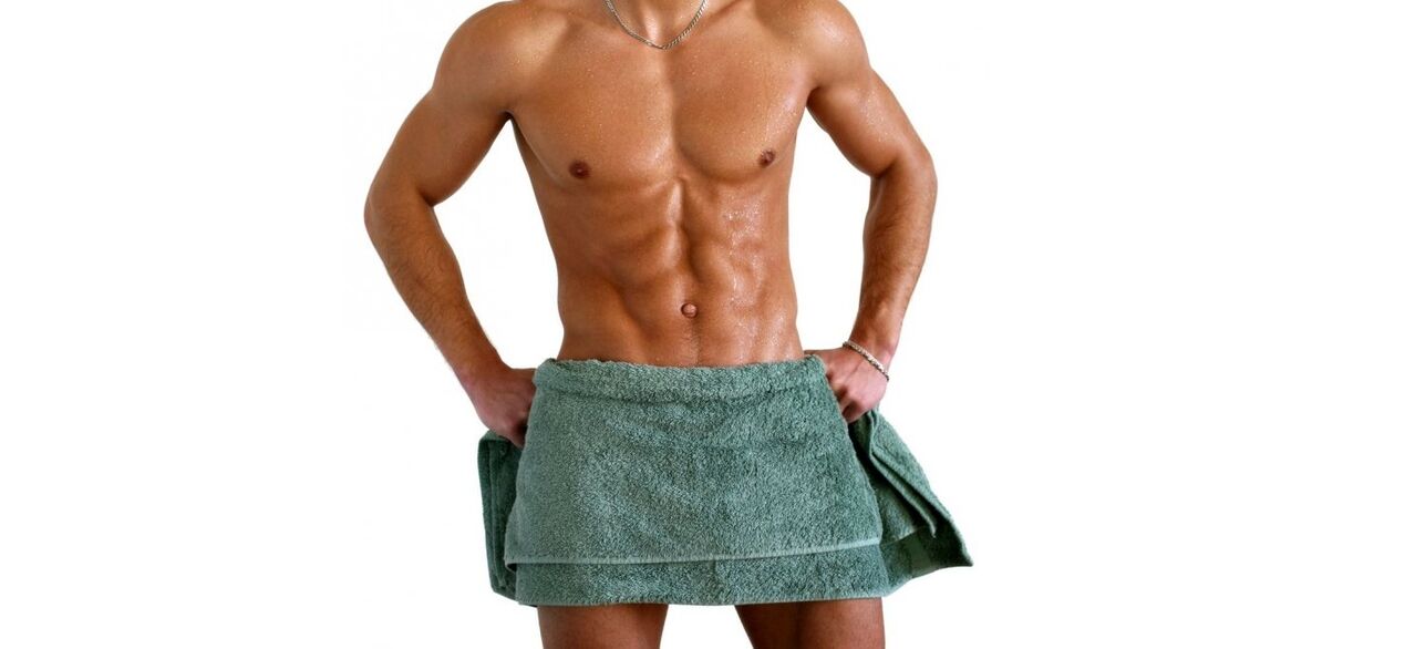Man wearing towel before penis enlargement